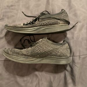 Nike Flyknit Racers Men 7.5/ Women 9
